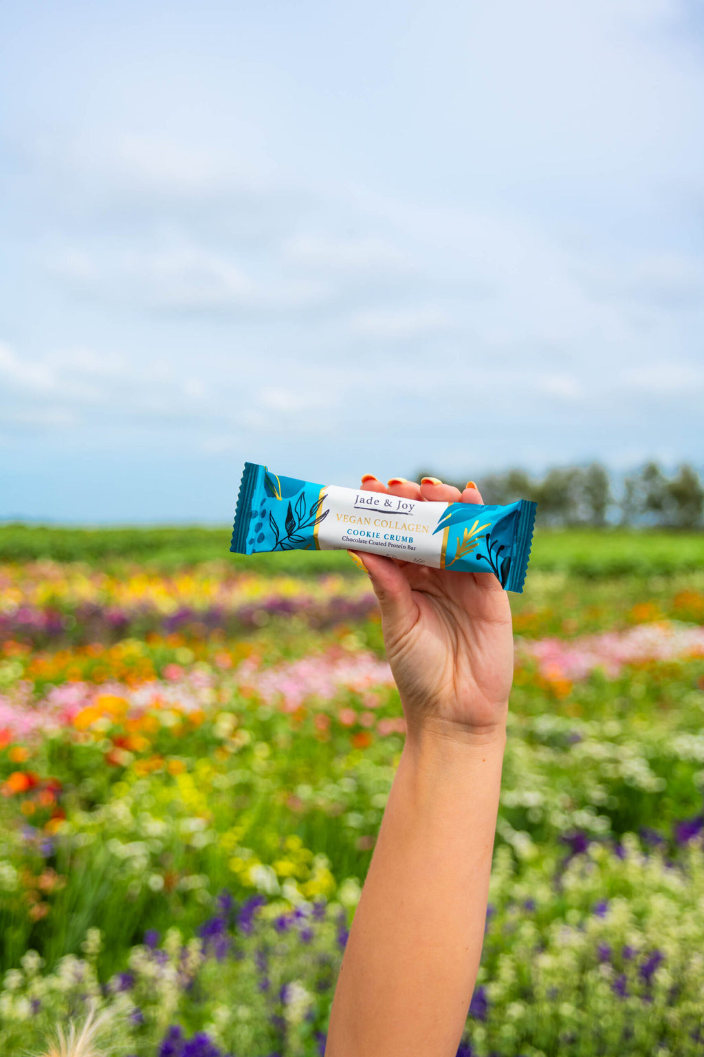 cookie crumble Jade Joy Vegan Collagen Protein Bar  plant based gluten free flower field