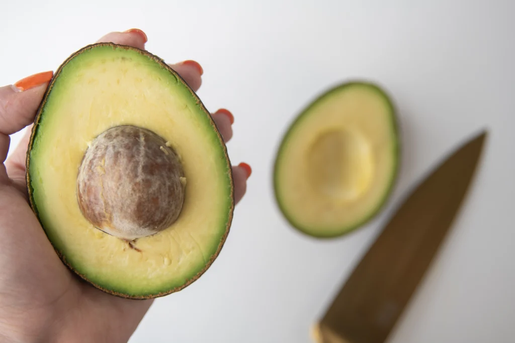 halved avocado for super greens smoothie