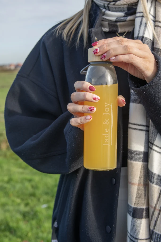 Energy and focus drink in glass bottle
